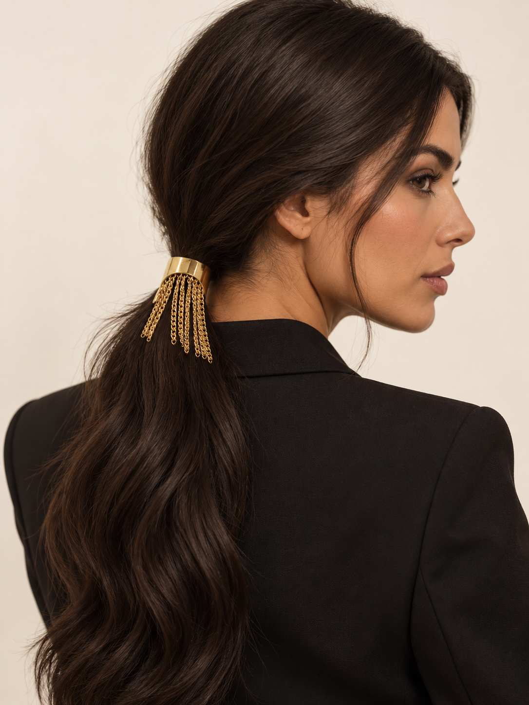 Cascade Pony Cuff in Gold styled in a ponytail