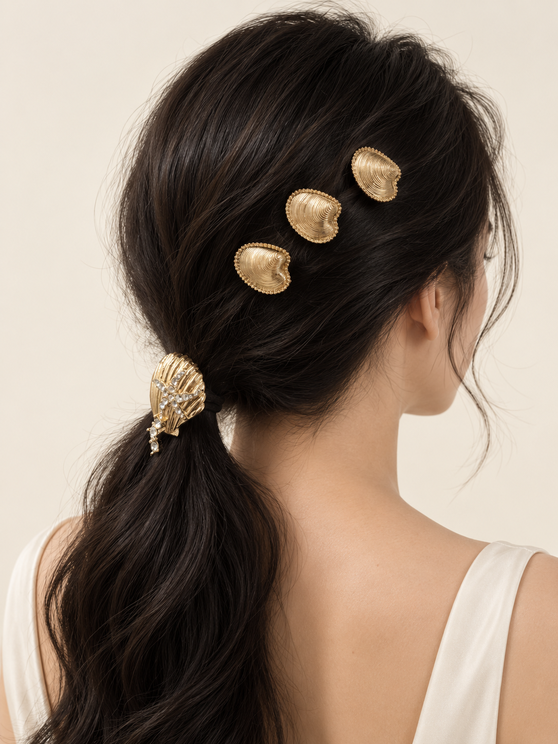 Coast Barrette Set styled in hair; only the three petite shell clips are included and other accessories shown are not included